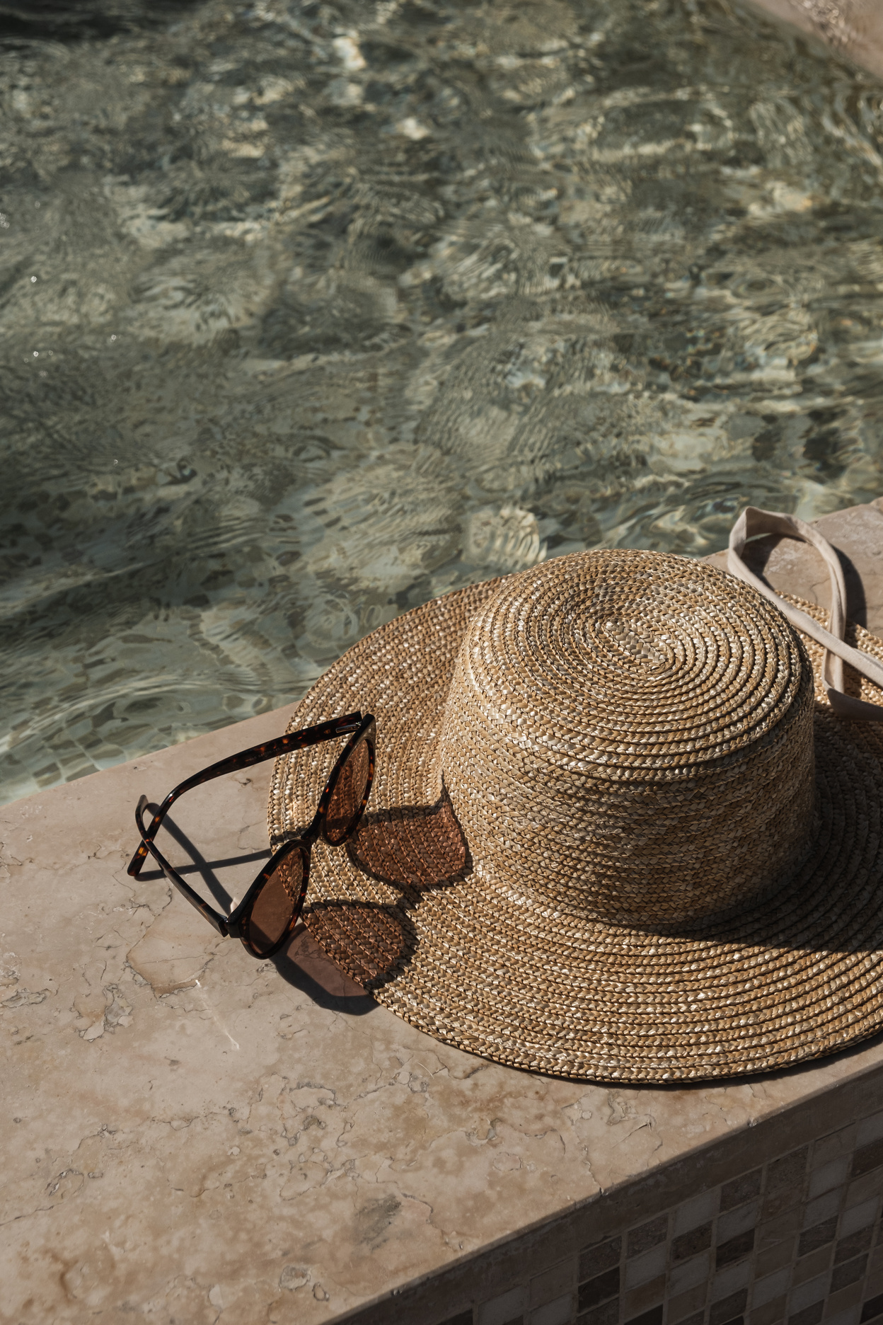 Summer Accessories on Swimming Pool Side 